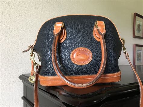 all weather leather dooney bourke fake|dooney and bourke duck purse.